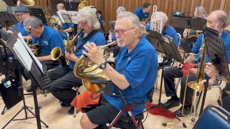 band-member-playing-french-horn